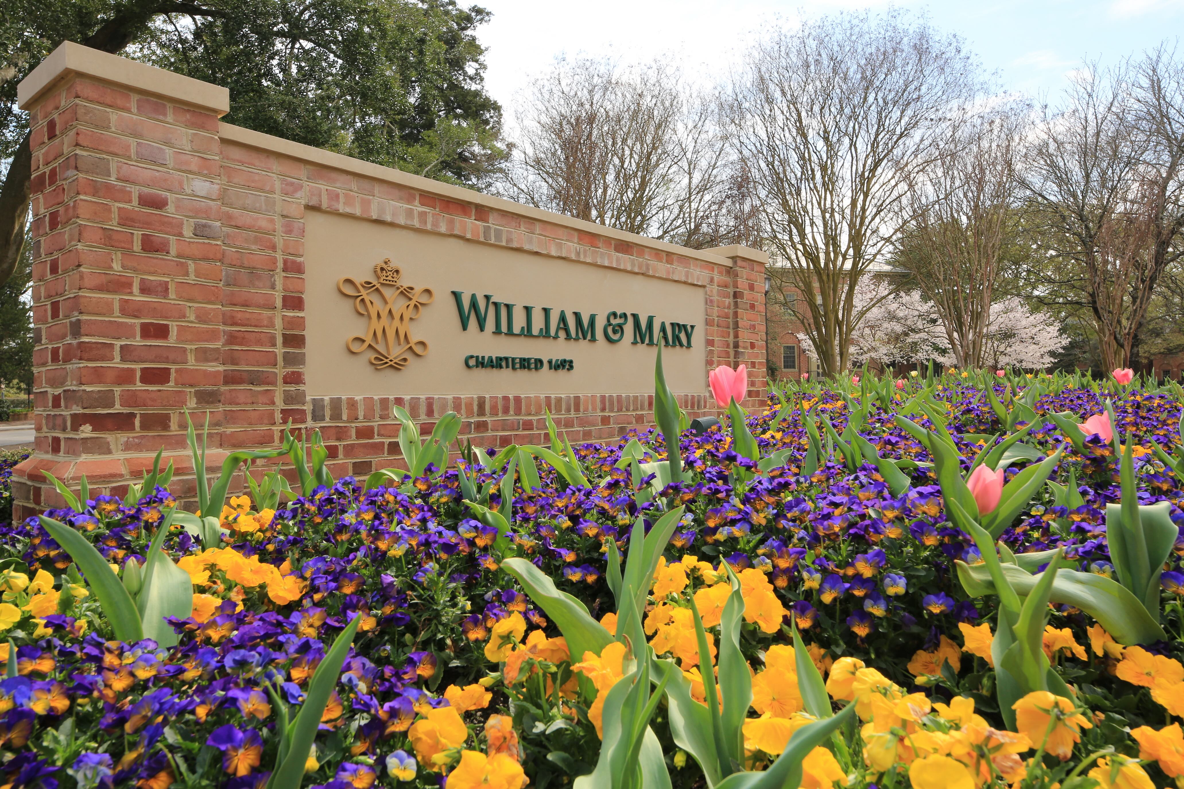 William and Mary sign in spring with flowers